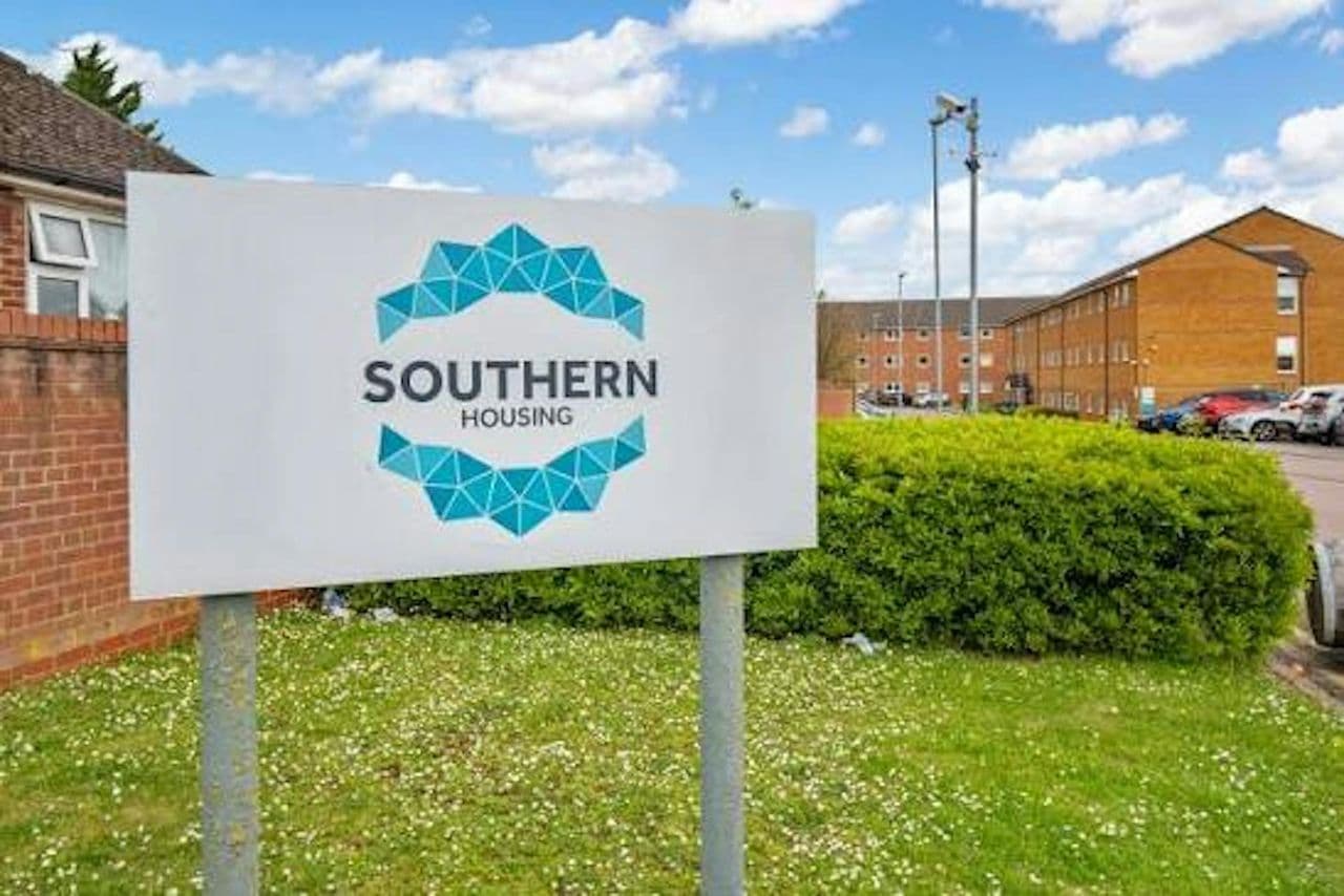 Southern Housing sign outside a brick apartment block